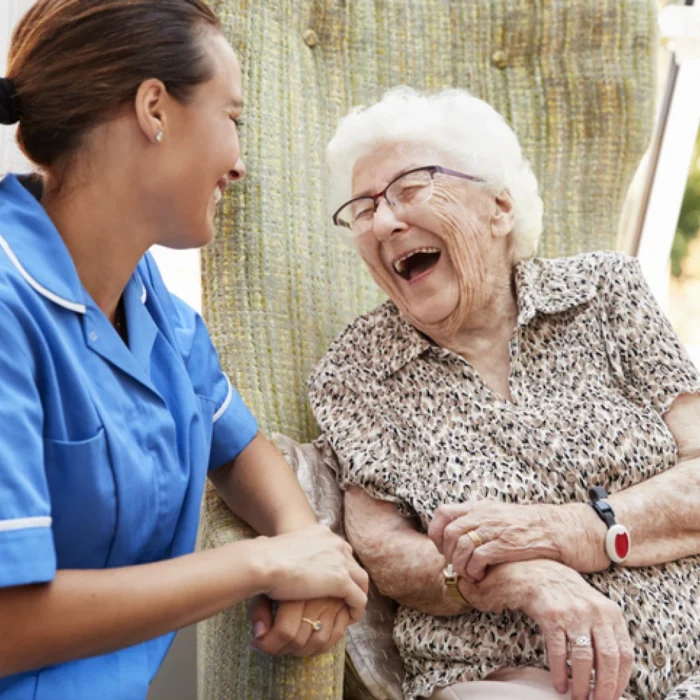 female nurse taking care of a senior
