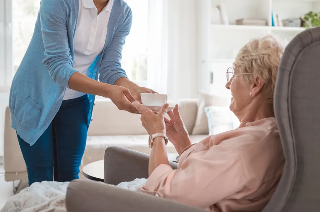 female nurse taking care of a senior
