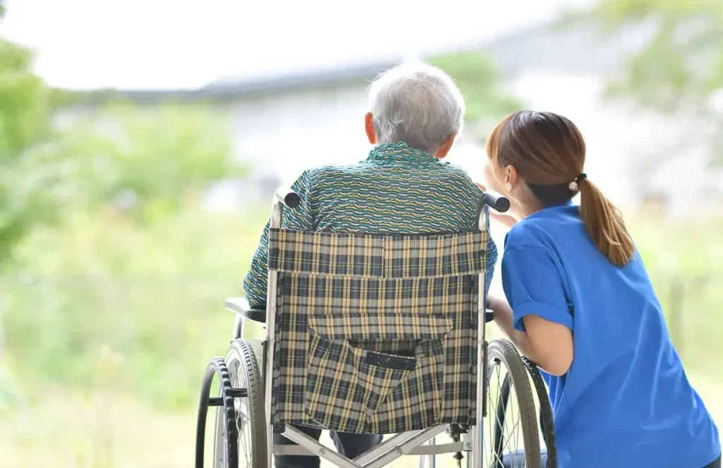 female nurse taking care of a senior