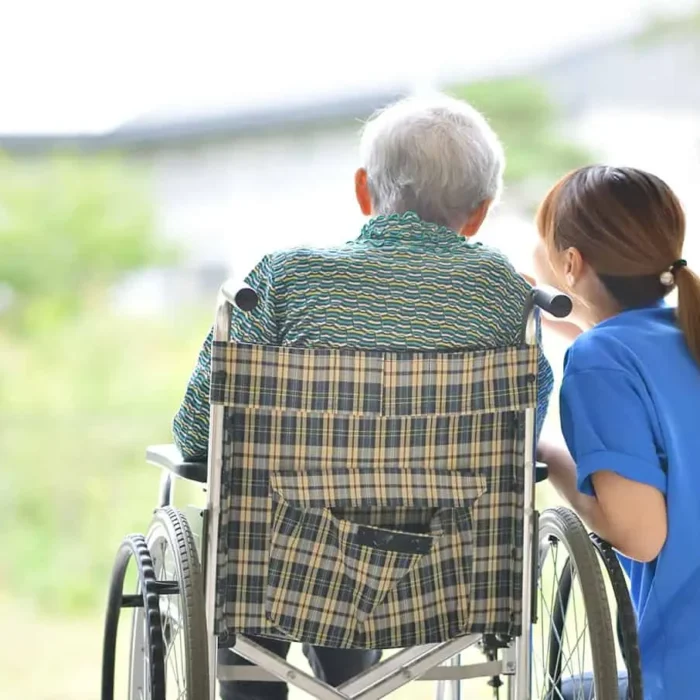 female nurse taking care of a senior